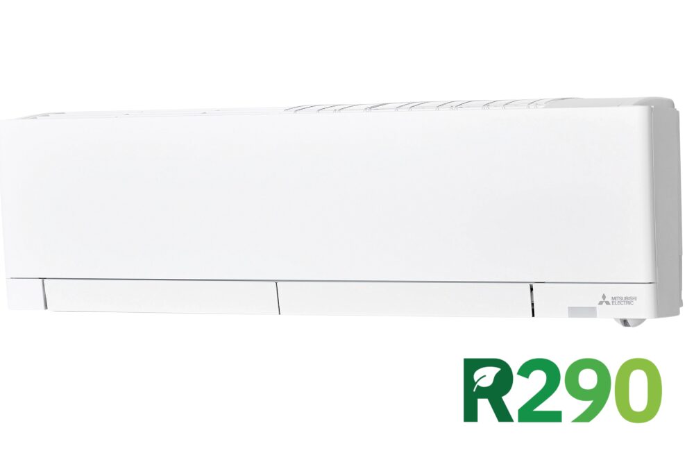 A white wall-mounted unit with a green model R290 is displayed against a plain background